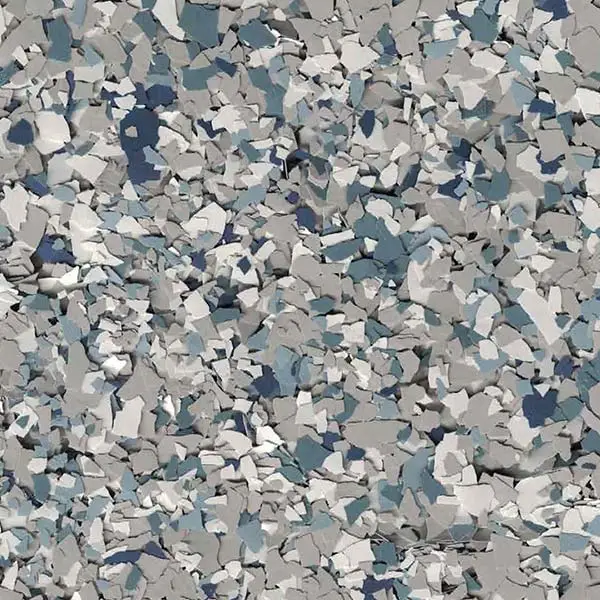 The image displays a close-up of decorative blue, gray, and white speckled flakes, often used for flooring or countertops. No people or landmarks visible.