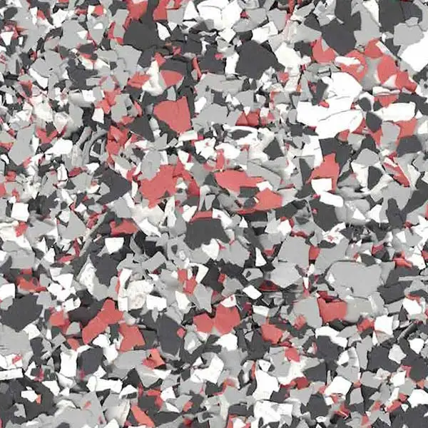 A textured surface with scattered fragments in shades of red, black, white, and gray, resembling a terrazzo pattern, without identifiable landmarks.