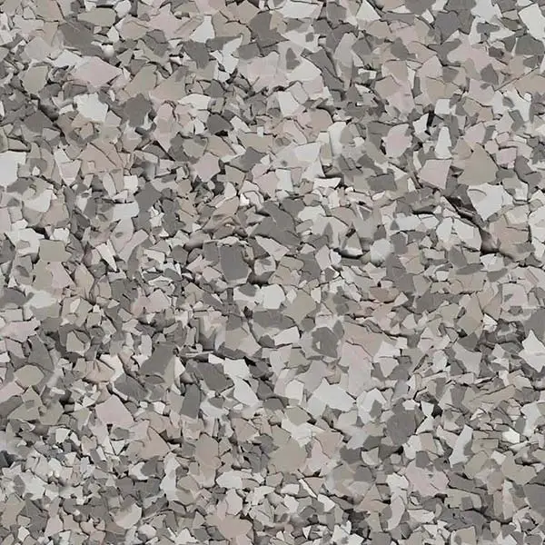 The image shows a textured surface covered in various shades of gray and white fragments, resembling a pebble or terrazzo pattern.