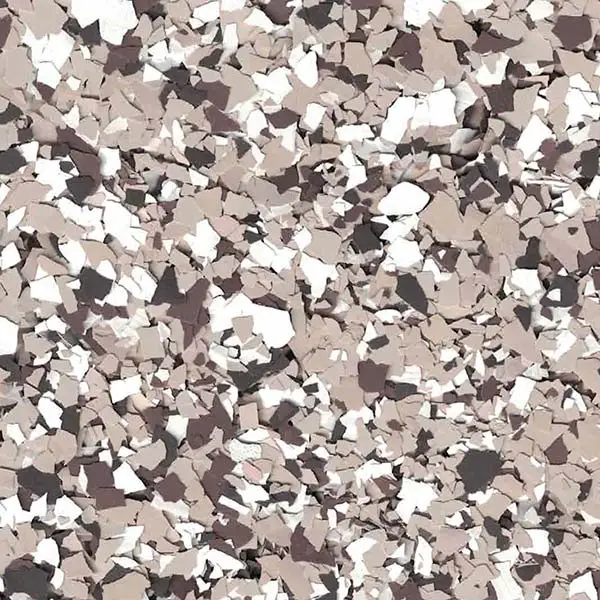 This image shows a close-up view of a speckled surface with various shades of beige, brown, and white fragments scattered throughout.