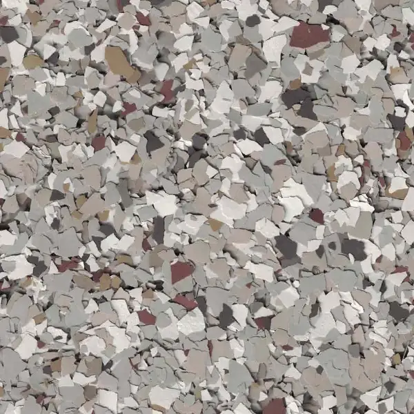 A close-up view of a textured surface featuring various shades of gray and brown stone-like fragments, resembling a decorative flooring material.